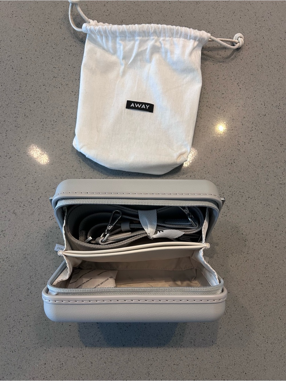 Away Mini Hard Shell Crossbody Bag in Light Gray with White Drawstring Pouch - Picture 3 of 3